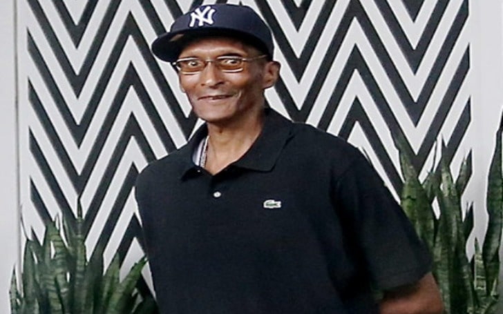 Joe Odom in a black cap and t-shirt.